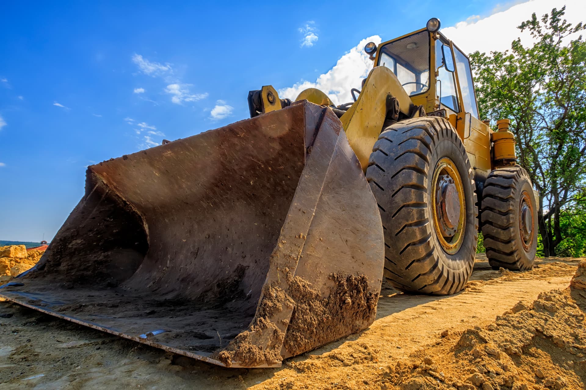 Wheel loader used in waste management operations