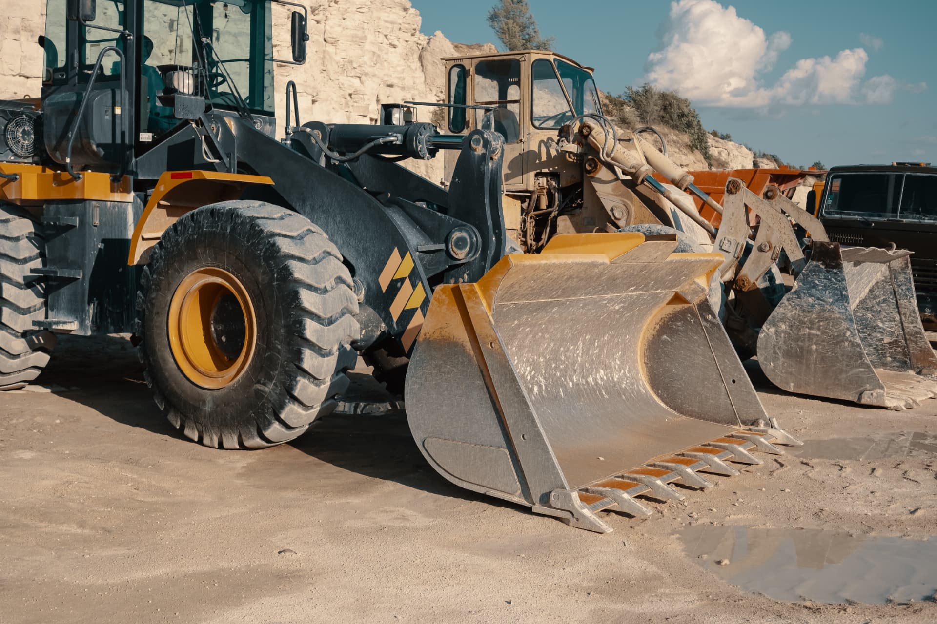 Wheel loaders working at a quarry and mining site